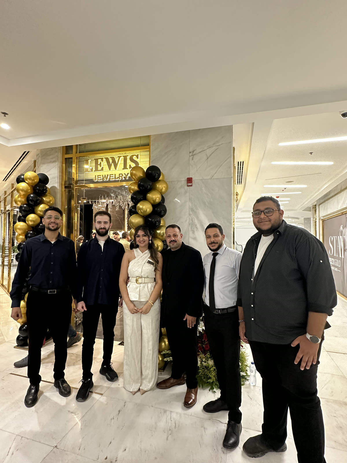 The SWH team outside the new Lewis Jewelry storefront on opening day.