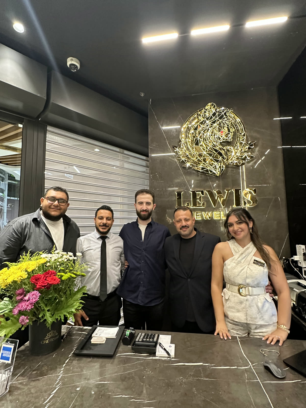 SWH staff behind the counter at the Lewis Jewelry Egypt opening.